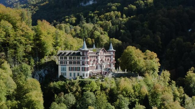Panoramic View Of Grandhotel Giessbach In Brienz, Switzerland During Autumn - Surrounded By Mountain Forests With Breathtaking Views Of The Lake Brienz Landscape - aerial drone