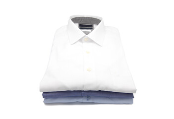 Men's shirts folded and stacked isolated on a white background