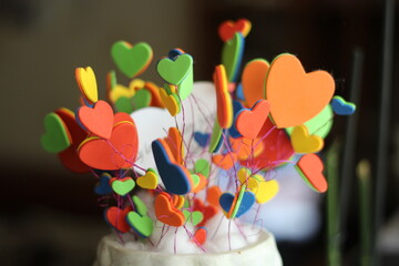 figures in the form of multi-colored hearts