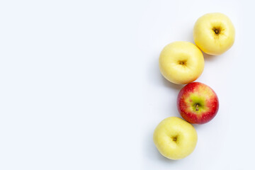 Juicy red and yellow apples on white