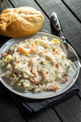 Coleslaw. Salad made of shredded white cabbage and grated carrot with mayonnaise.