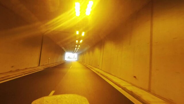 Helmet camera view of motorcycle travelling on empty highway. Peloponnese highway Moreas, summer of 2020