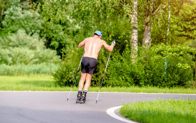 man roller skating in the summer Park
