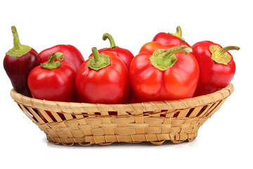 Fototapeta na wymiar Sweet pepper in a basket isolated on a white background