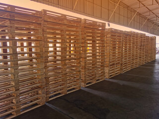 Wooden pallets stack in warehouse cargo storage, shipment in logistics and transportation industrial, wood pallets heap, delivery service