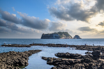 Jeju Island is a representative tourist destination in Korea. This is Beomseom Island seen from Seogwipo Coastal Trail.
