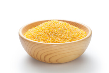 Corn grits in a wooden bowl isolated on white background.