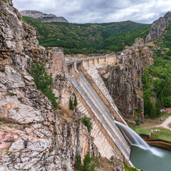 Fototapeta na wymiar Profile view of dam spillway with zigzag steps
