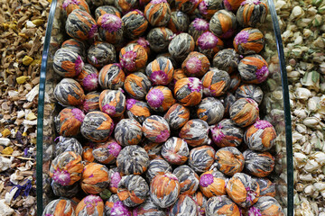 Retail display shelf of colorful fried flower leaves