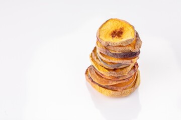 slices of dried peach on a white background. dried fruits. eco. macro.