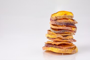 slices of dried peach on a white background. dried fruits. eco. macro.