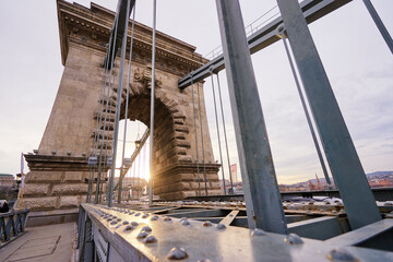 Chain bridge at sunset time on Danube river in Budapest city, Hungary.
