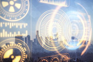 Double exposure of technology theme hologram and cityscape background. Concept of Hightech.