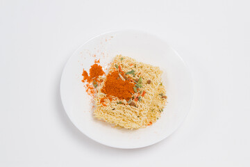 Chinese noodles on white plate on white background