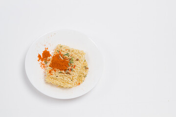 Chinese noodles on white plate on white background	
