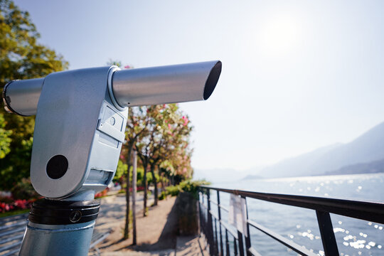 Coin Operated Spyglass viewer next to the waterside promenade looking out to the bay. - Powered by Adobe