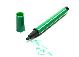 Green felt pen marker with scribble lines, isolated on white background