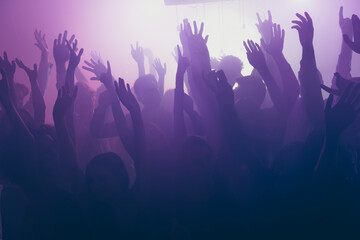 Photo of big group careless funny people raise hands rejoice wear stylish trendy outfit modern club...