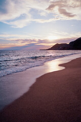 Fototapeta na wymiar Beautiful landscape. Sea beach at sunset time.
