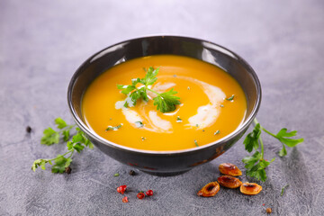 pumpkin soup with herbs and cream