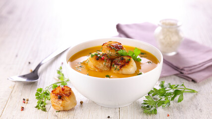 soup with fried scallop and herbs