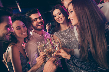 Close-up portrait of attractive cheerful lovers couples having fun enjoying drinking clinking...