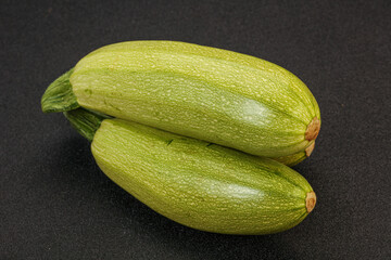 Young tasty zucchini over board