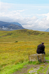 Old man resting at Loch Tulla Viewpoint - Scotland - United Kingdom