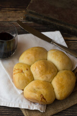 Salty filled buns on a wooden background.