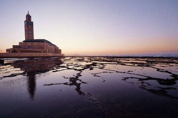 Fototapeta na wymiar Travel by Morocco. Hassan II Mosque during the sunset in Casablanca.