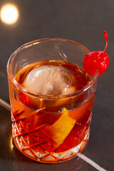 Red cherry cocktail on a restaurant table