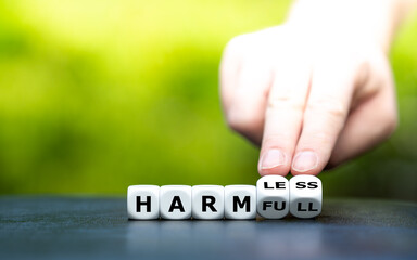 Hand turns dice and changes the word 