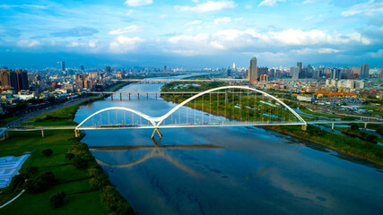 Obraz premium July 11, 2018, Aerial view of Crescent Bridge in New Taipei City, Taiwan.