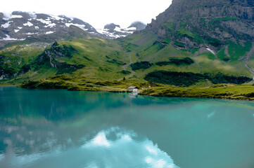 Swiss alpine lake - 387345672
