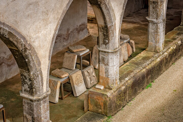 Cloister Section With Ancient Artefacts. Tomar, Portugal.