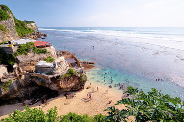 Uluwatu beach and surfing spot. Beautiful landscape with rock and ocean. Bali, Indonesia.