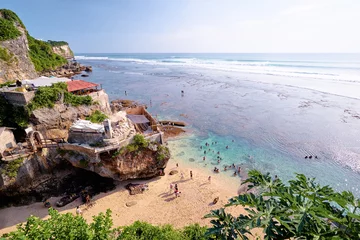 Tuinposter Uluwatu beach and surfing spot. Beautiful landscape with rock and ocean. Bali, Indonesia. © luengo_ua