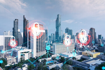 Padlock icon hologram over panorama city view of Bangkok to protect business in Asia. The concept of information security shields. Double exposure.
