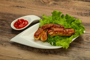 Roasted chicken white sausages with ketchup