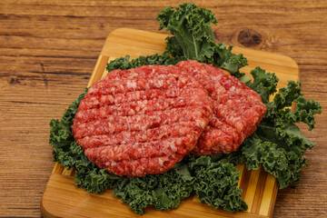 Raw beef burger cutlet for cooking