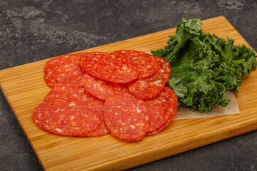 Italian spycy pepperoni sausage slices