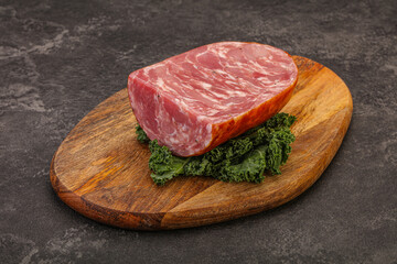 Beef ham piece over board