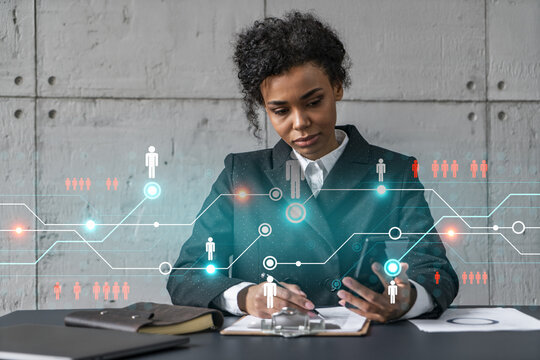 Businesswoman taking notes and social media icons hologram. Double exposure. Technology security network solution concept.