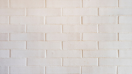 Close-up white brick wall, with staggered tiles and porous texture, home decor or interior design inspiration, stack or stagger of bricks, tiles or stones, pleasing symmetrical pattern with copy space