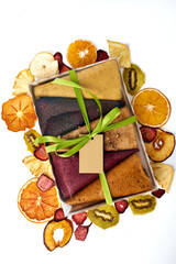 Fruit pastille in craft paper box and dried fruits