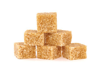 Brown sugar cubes isolated on white

