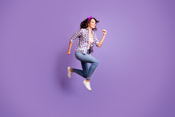 Fototapeta na wymiar Profile photo portrait of cute pretty brown hair woman wear vintage checkered shirt jumping high isolated violet color background