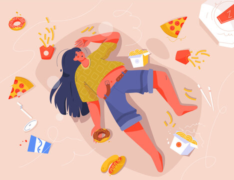 Sad fat woman eating fast food, lying on floor