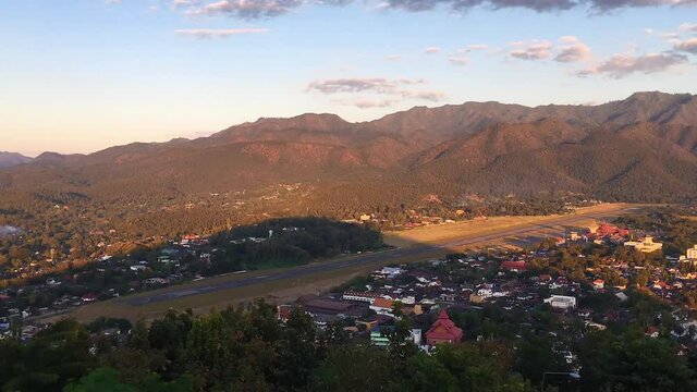 Time Lapse HD video, Airplane taking off from the airport, Mae Hong Son airport Thailand sunset time.	
