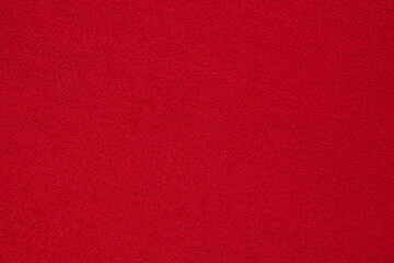 Red fabric cloth texture background close up